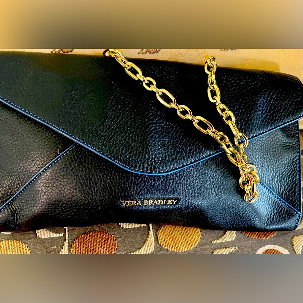 Vera Bradley, leather clutch.
